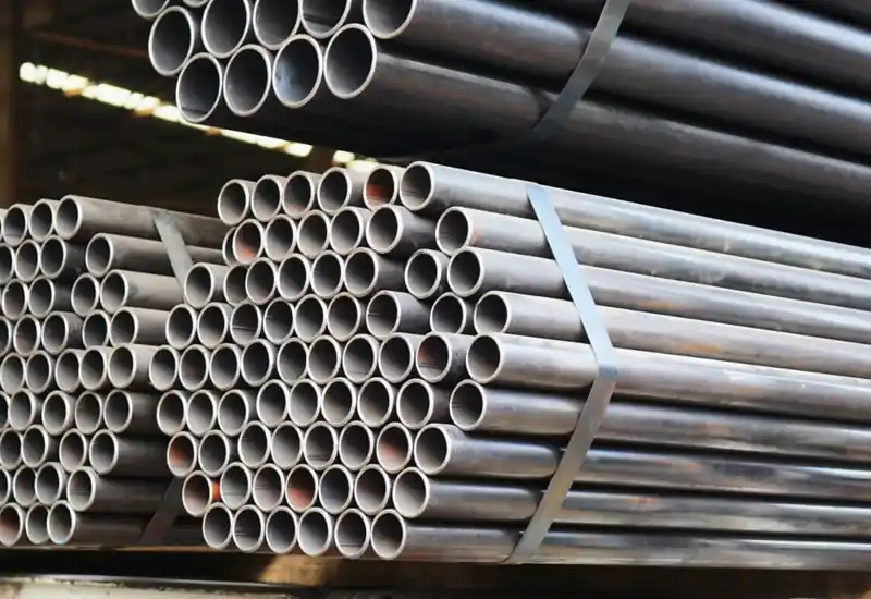Bundled alloy pipe in storage
